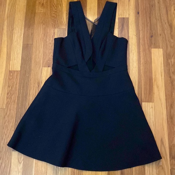 BCBGMaxAzria Dresses & Skirts - BCBGMaxAzria Women’s Black Mini Dress With Mesh Detailing Size 12